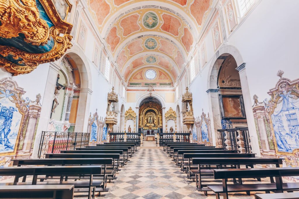 Ornate chapel with frescos of the Convento do Espinheiro in Evora, Portugal