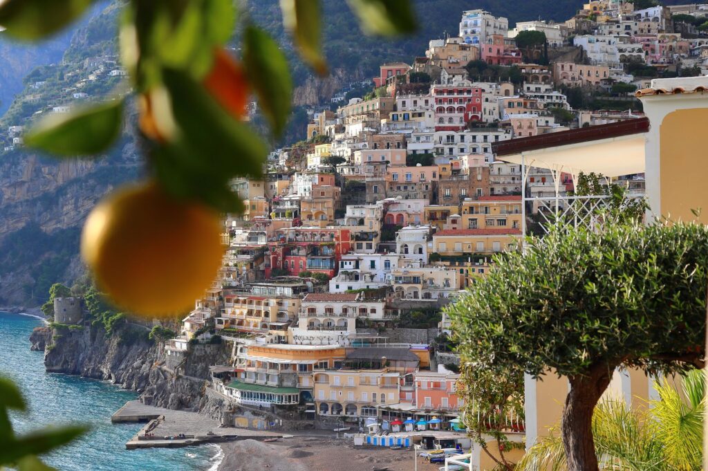 Coloured house perch on the rocks beside the sea in Capri, Italy