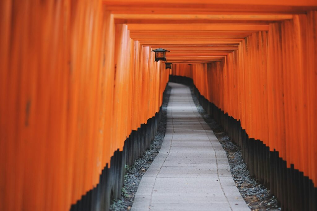 View looking down the tunnel of torii gates at Fushimi Inari Shrine, Kyoto