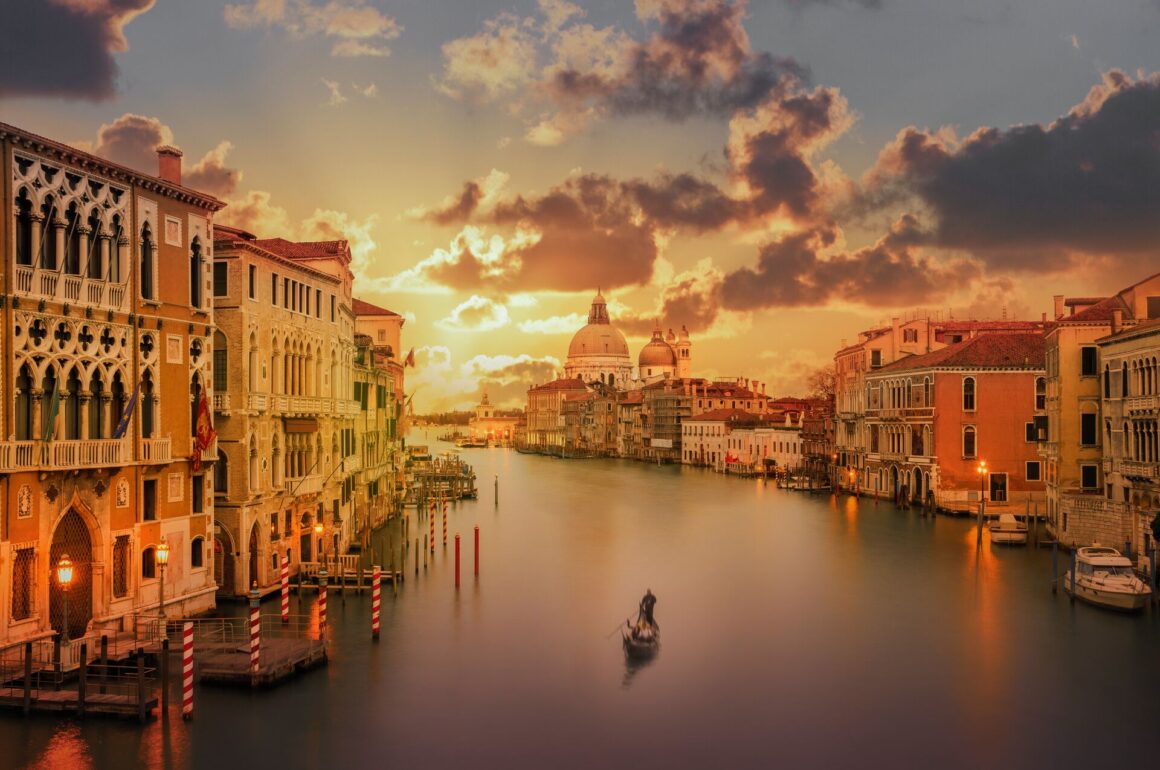 Gondola in the Grand Canal in Venice at sunset